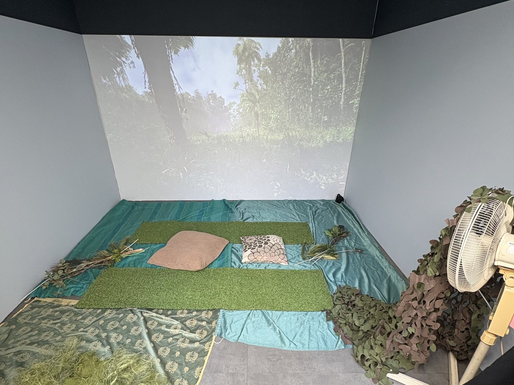 Physical set dressing inside the CAVE space ahead of a Fractured Eden showing.