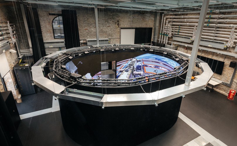 External view of the Reality Emulator's circular screen structure inside its facility at the University of Bristol.